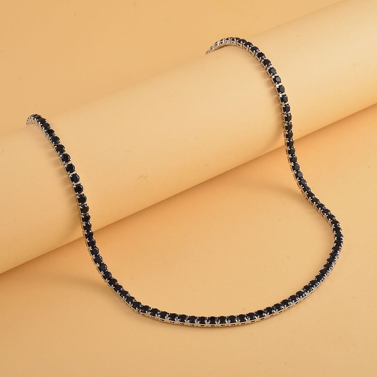 Simulated Black Diamond Tennis Necklace 18-26 Inches with Bolo Slider in Silvertone image number 1