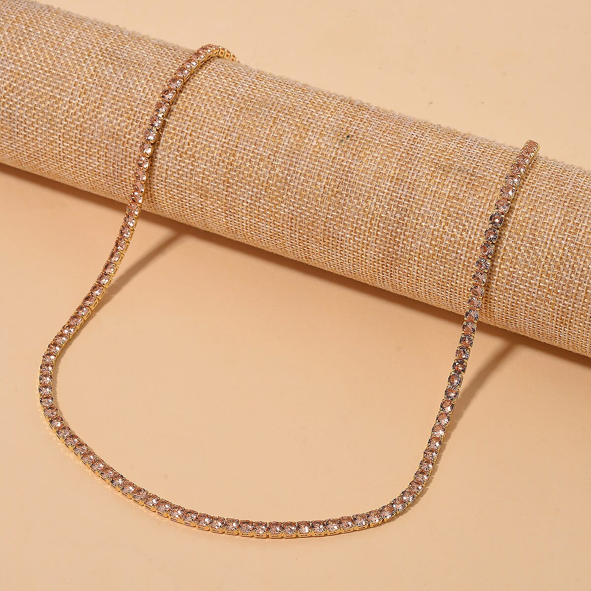 Simulated Champagne Diamond Tennis Necklace 18-26 Inches with Bolo Slider in Goldtone image number 1