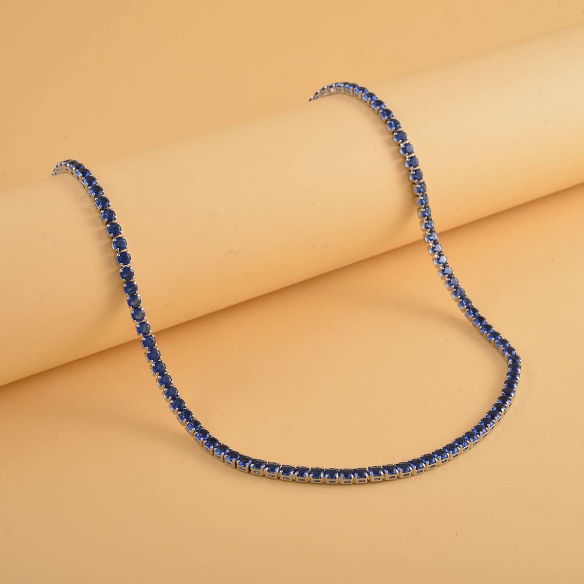 Simulated Sapphire Tennis Necklace 18-26 Inches with Bolo Slider in Silvertone image number 1