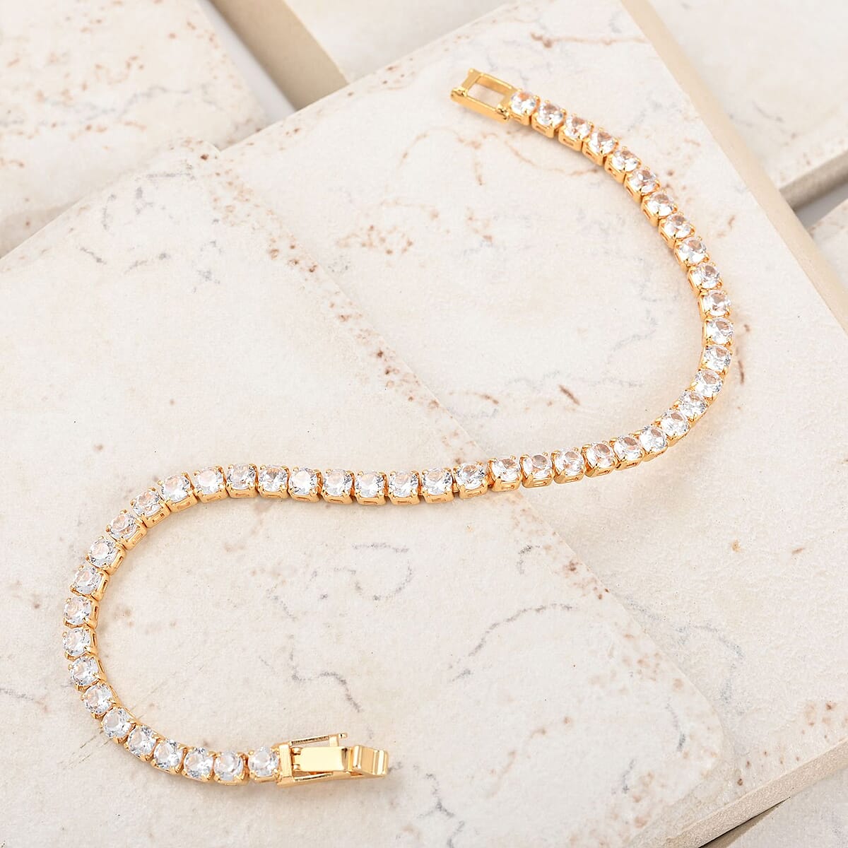 Simulated Diamond Tennis Bracelet in Goldtone (7.00 In) 8.00 ctw image number 1