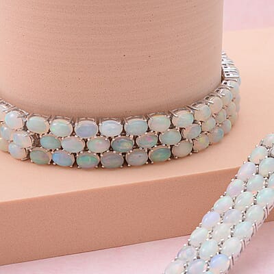 Premium Ethiopian Welo Opal 34.00 ctw Triple-Row Tennis Bracelet in Platinum Over Sterling Silver (6.50 In)