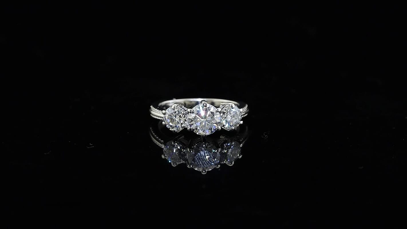 Moissanite 3 Stone Ring in Platinum Over Sterling Silver 1.75 ctw