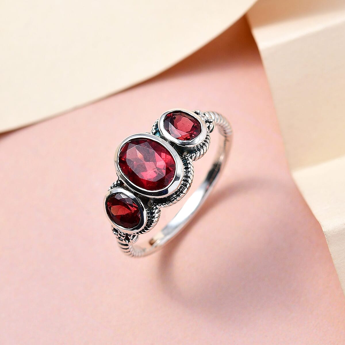 Artisan Crafted Tanzanian Wine Garnet 3 Stone Ring in Sterling Silver (Size 9.0) 2.25 ctw image number 1