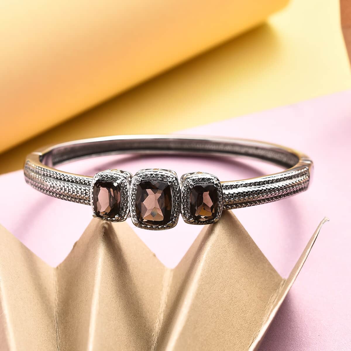 Brazilian Smoky Quartz 5.75 ctw Trilogy Bangle Bracelet in Stainless Steel (6.50 In) image number 1