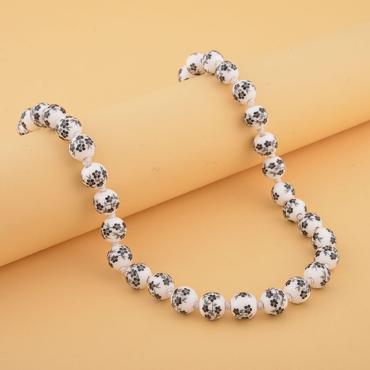 Black Flower Ceramic Beaded Knotted Necklace 20 Inches in Silvertone image number 1