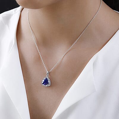 Rhapsody 950 Platinum AAAA Tanzanite and E-F VS2 Diamond Halo Pendant 3.40 ctw