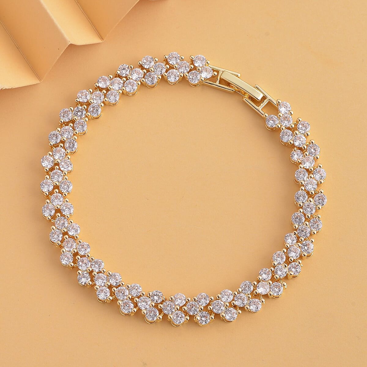 Simulated Diamond Braid Layer Bracelet in Goldtone (6.75 In) image number 1