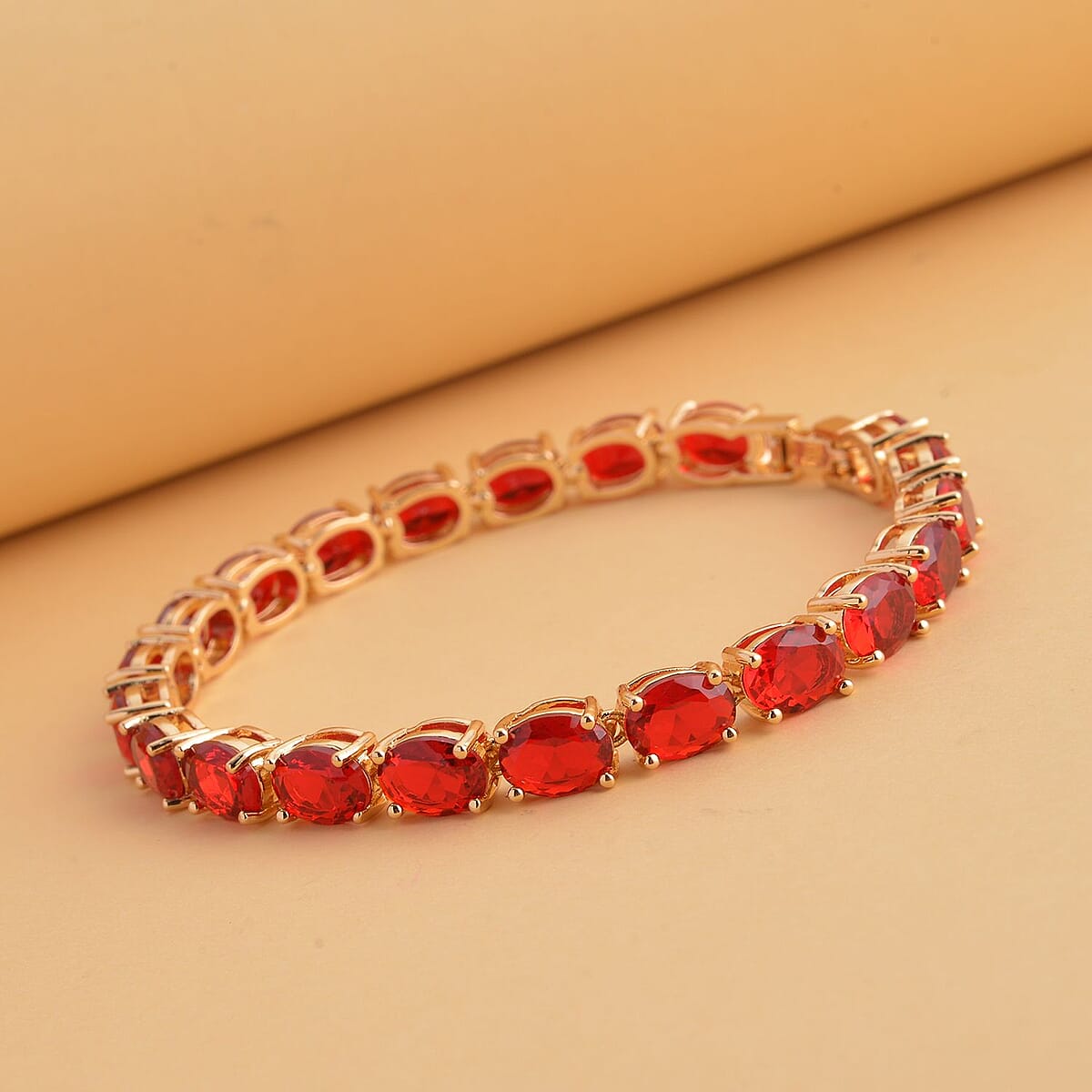 Simulated Red Diamond Tennis Bracelet in Goldtone (7.50 In) 35.00 ctw image number 1