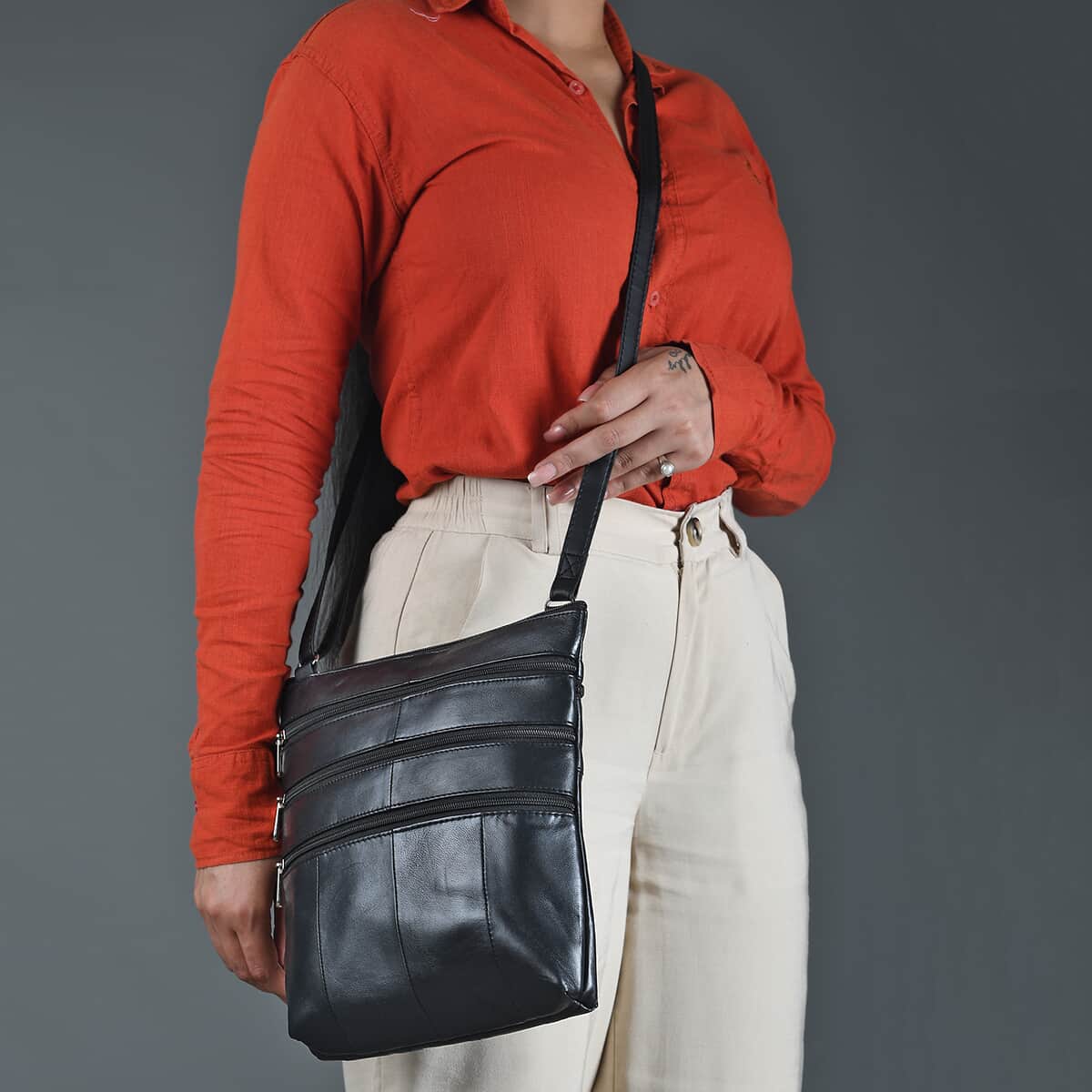 100% Genuine Leather Crossbody Bag;   Color: Black;  Size: 9.50 L x 1.5 W x 11 H INCH image number 1