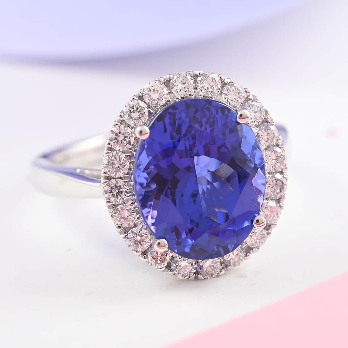 Doorbuster Red Carpet Collection Certified & Appraised RHAPSODY 950 Platinum AAAA Tanzanite and E-F VS Diamond Halo Ring 8 Grams 6.40 ctw image number 1