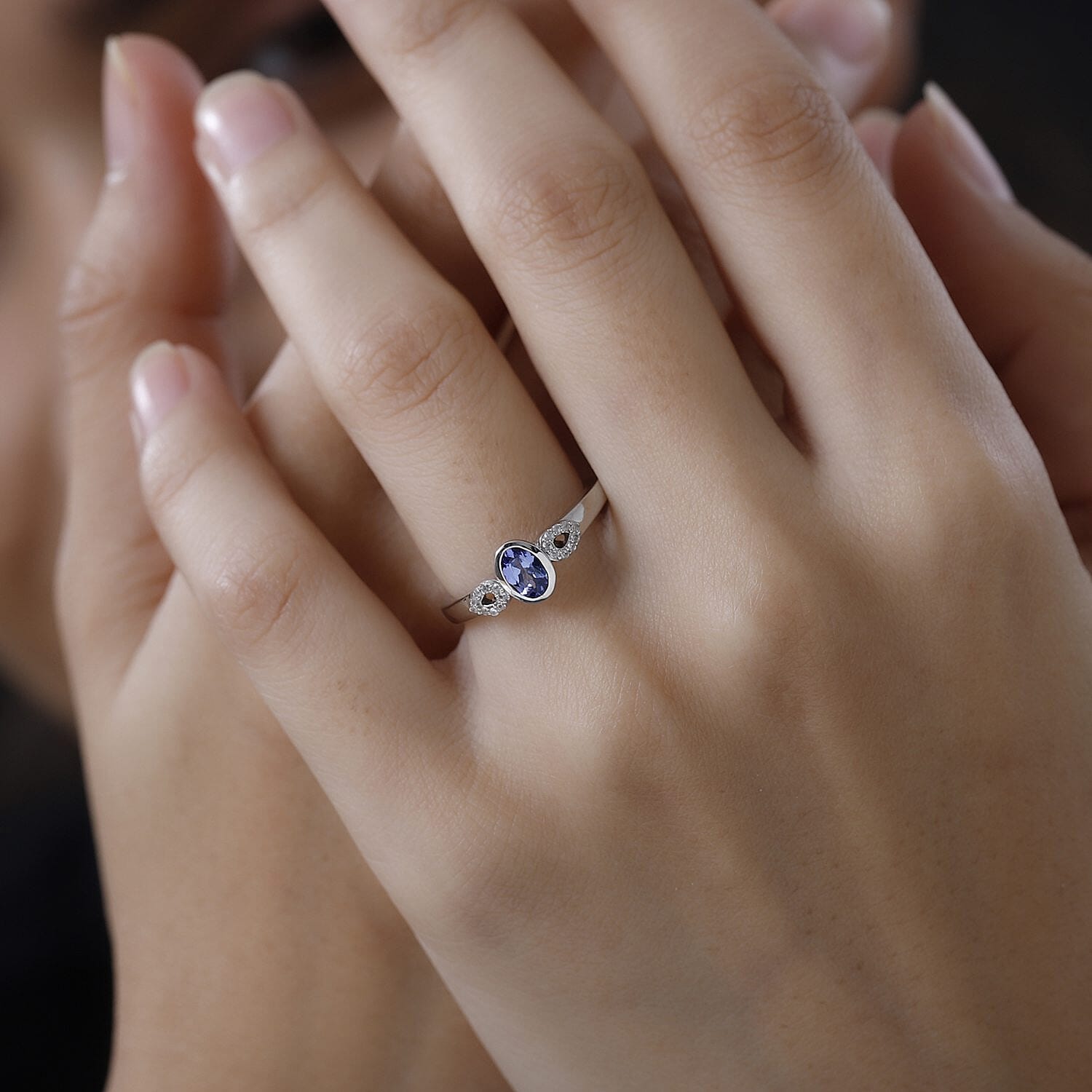 Tanzanite and White Zircon 0.65 ctw Ring in Platinum Over Sterling Silver (Size 10.0)