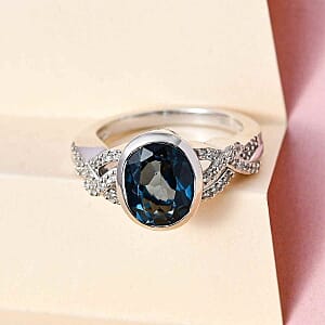 London Blue Topaz and White Zircon 5.09 ctw Ring in Platinum Over Sterling Silver (Size 9.0)
