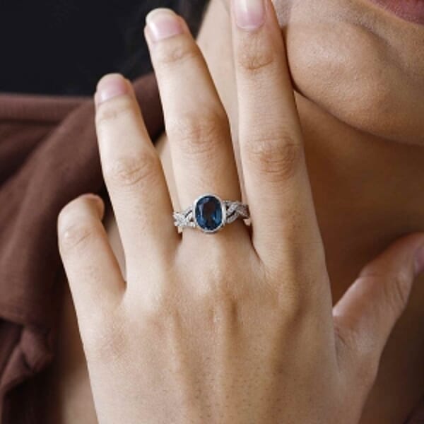 London Blue Topaz and White Zircon 5.09 ctw Ring in Platinum Over Sterling Silver (Size 9.0)