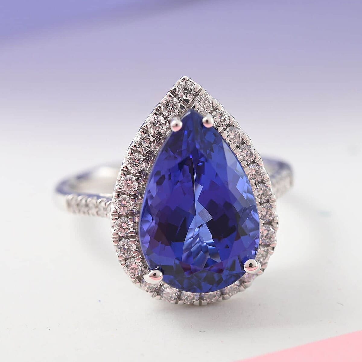 Certified & Appraised Rhapsody 950 Platinum AAAA Tanzanite and E-F VS Diamond Halo Ring (Size 6.0) 6 Grams 6.25 ctw image number 1