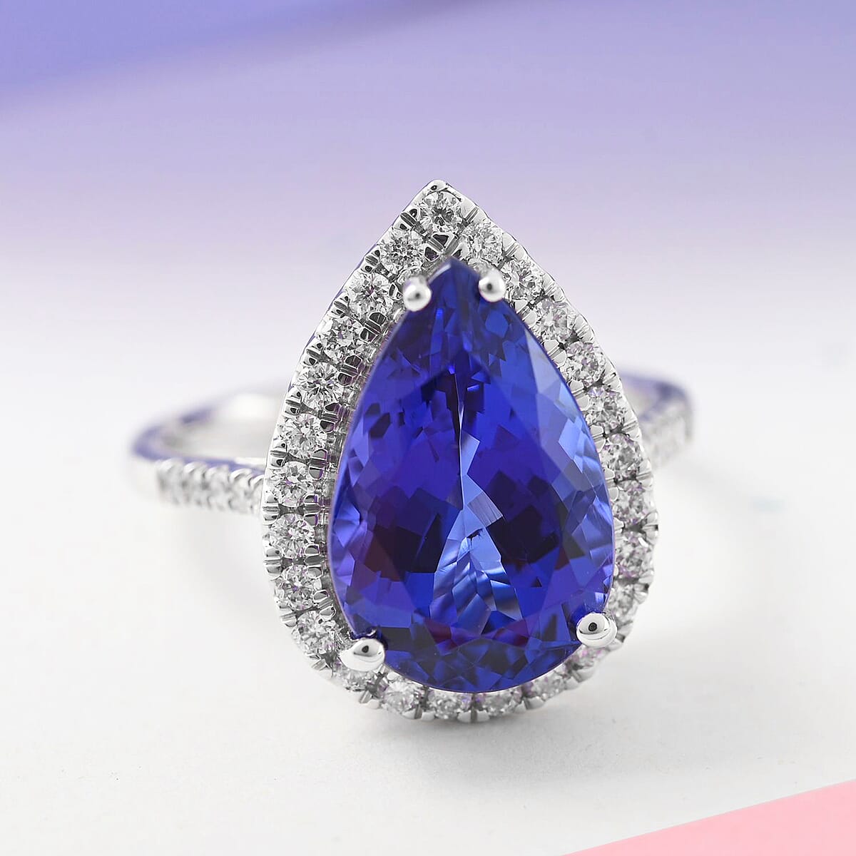 Certified & Appraised Rhapsody 950 Platinum AAAA Tanzanite and E-F VS Diamond Halo Ring (Size 7.0) 6 Grams 6.25 ctw image number 1