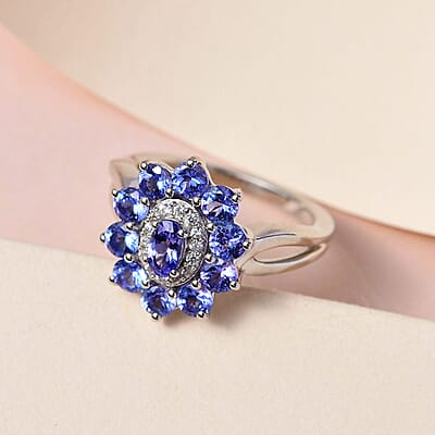 AAA Tanzanite and Natural White Zircon Floral Ring in Platinum Over Sterling Silver (Size 10.0) 1.50 ctw