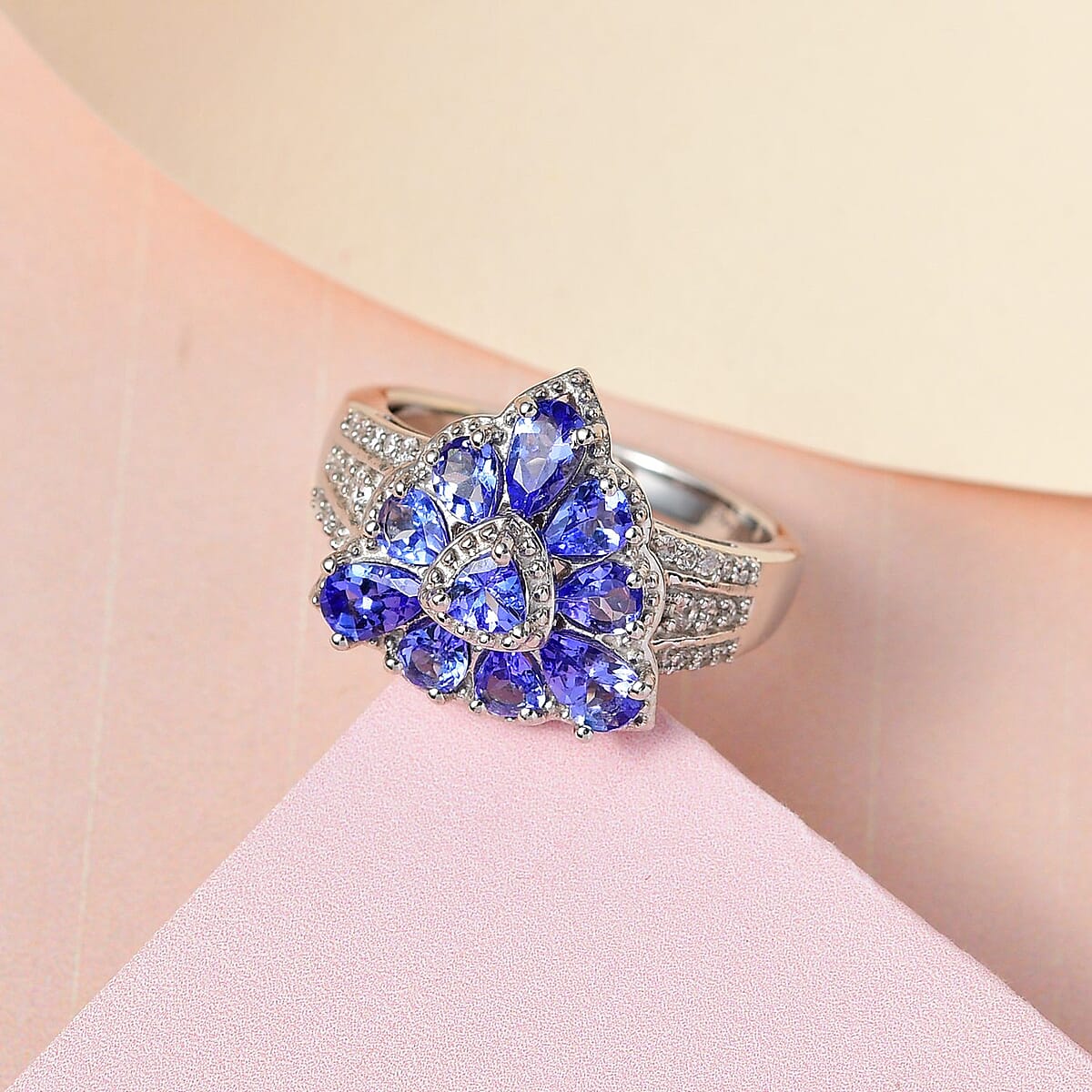 AAA Tanzanite and White Zircon Floral Ring in Platinum Over Sterling Silver (Size 6.0) 1.85 ctw image number 1