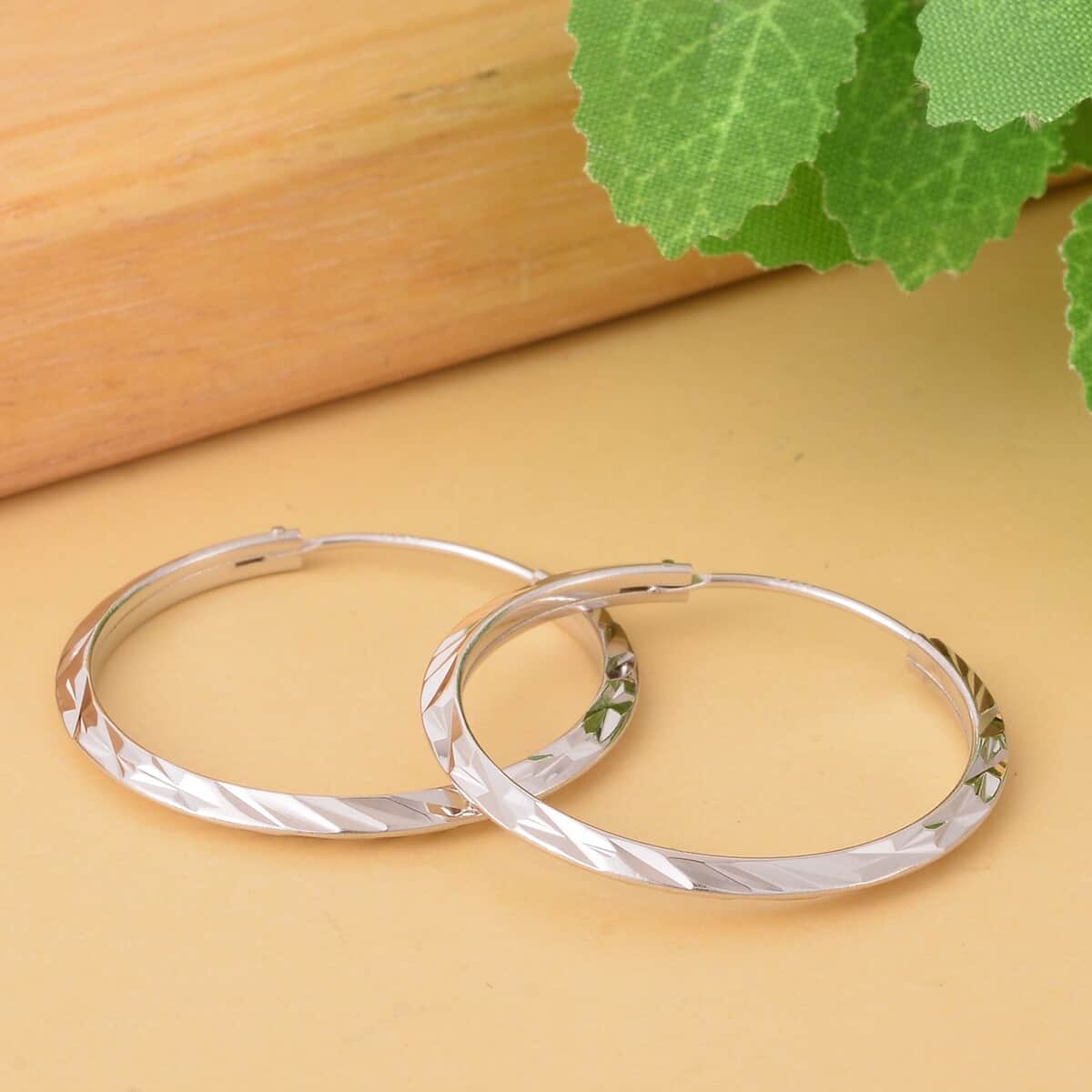 Rhodium Over Sterling Silver Pebble Cut Hoop Earrings 2.50 Grams image number 1