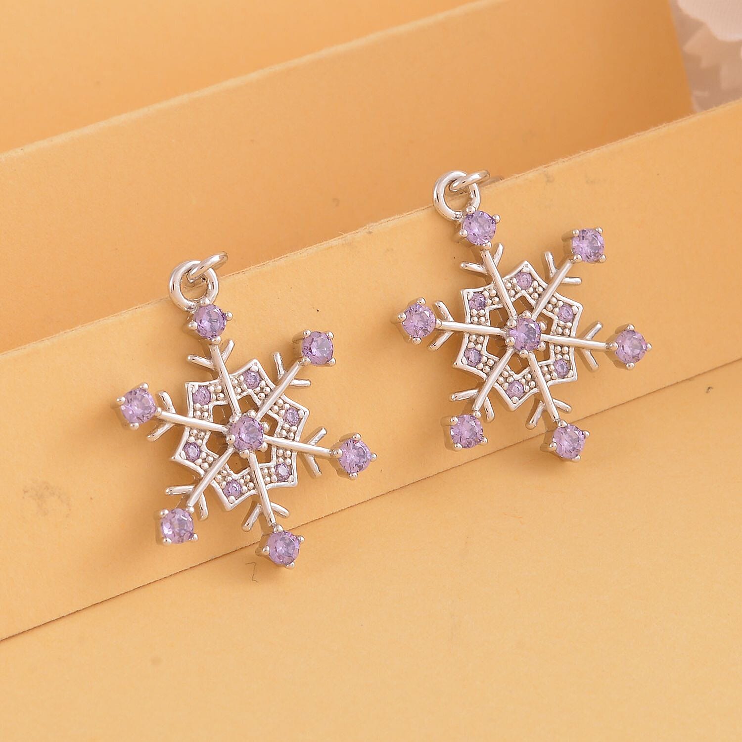 Simulated Purple Diamond Snowflake Earrings in Rhodium Over Sterling Silver