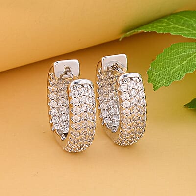 Simulated Diamond Huggie Hoop Earrings in Silvertone 1.00 ctw