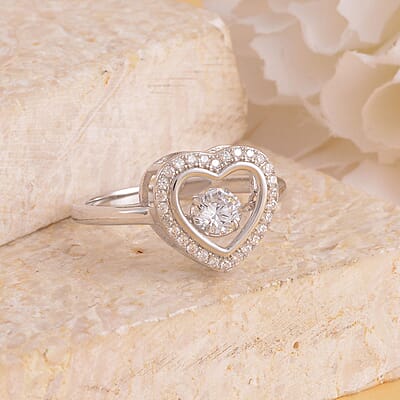 Simulated Diamond Heart Shape Dancing Ring in Rhodium Over Sterling Silver (Size 5.0) 1.00 ctw