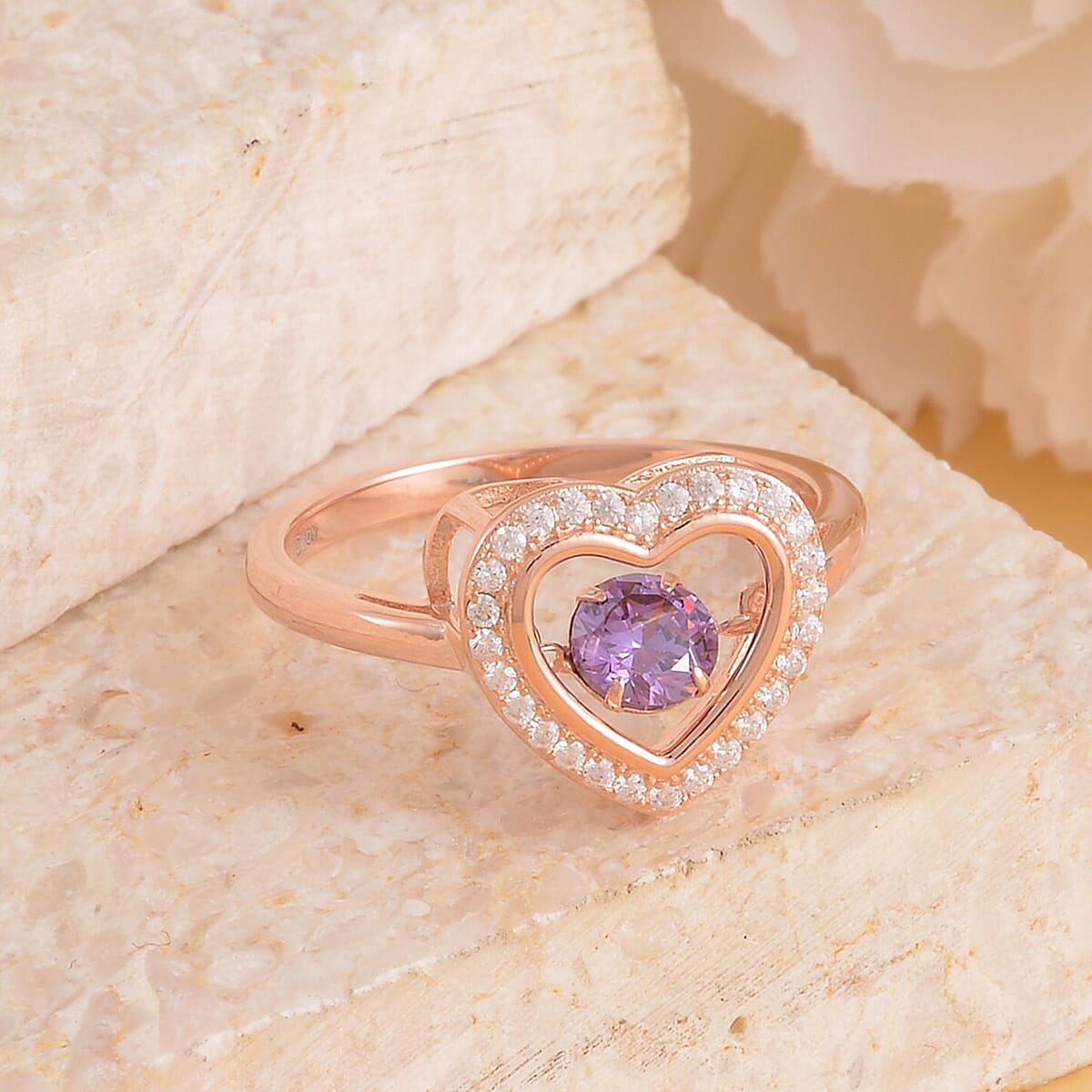 Simulated Purple and White Diamond Heart Shape Dancing Ring in 14K Rose Gold Over Sterling Silver (Size 8.0) 1.00 ctw image number 1