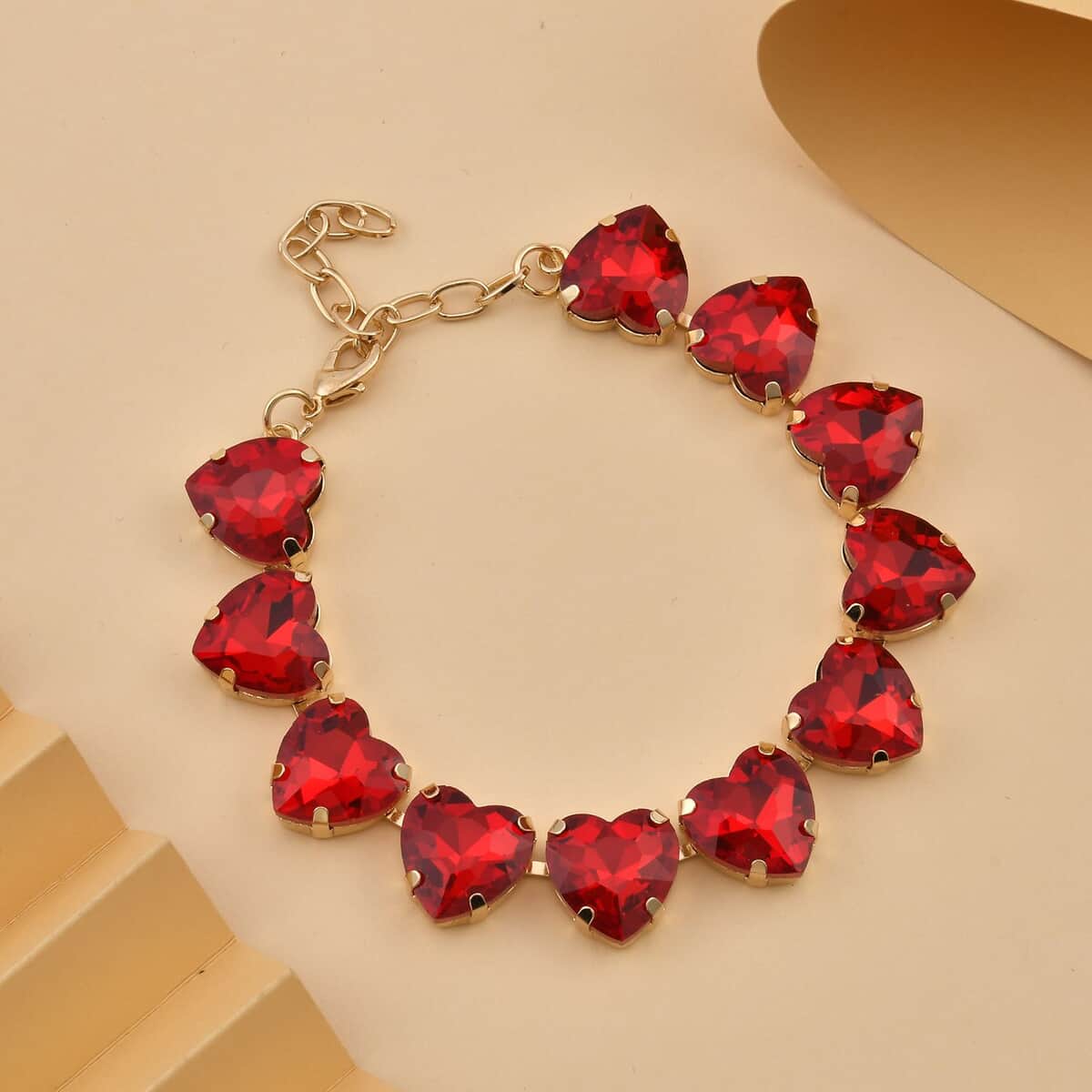 Red Glass Heart Bracelet in Goldtone (7.50-9.50In) image number 1