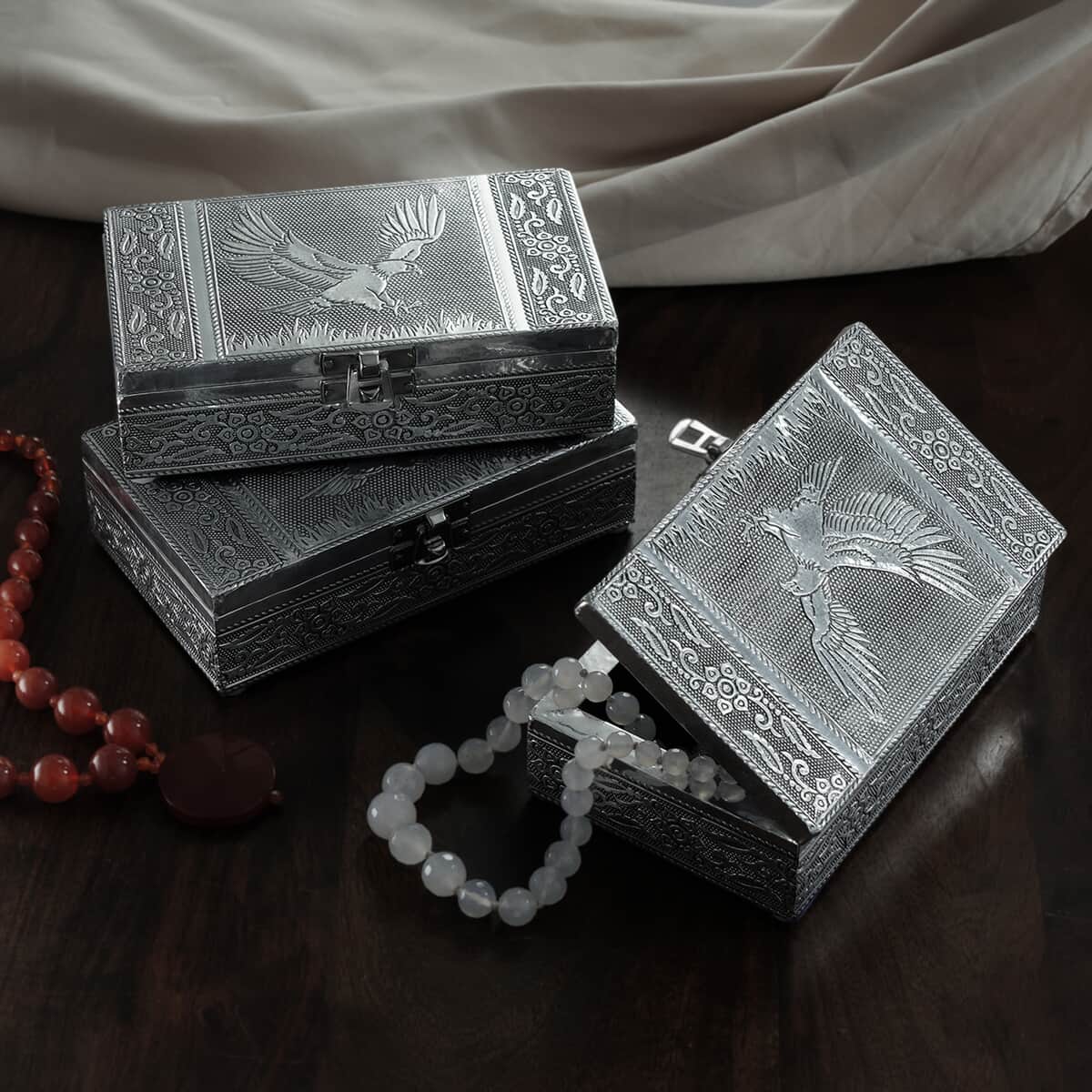 "Set of 3, Eagle Embossed Rectangular Aluminium Oxidized Storage Boxes SIZE: 6.5(L)x4(W)x1.75(H) inches COLOR: Silver" image number 1