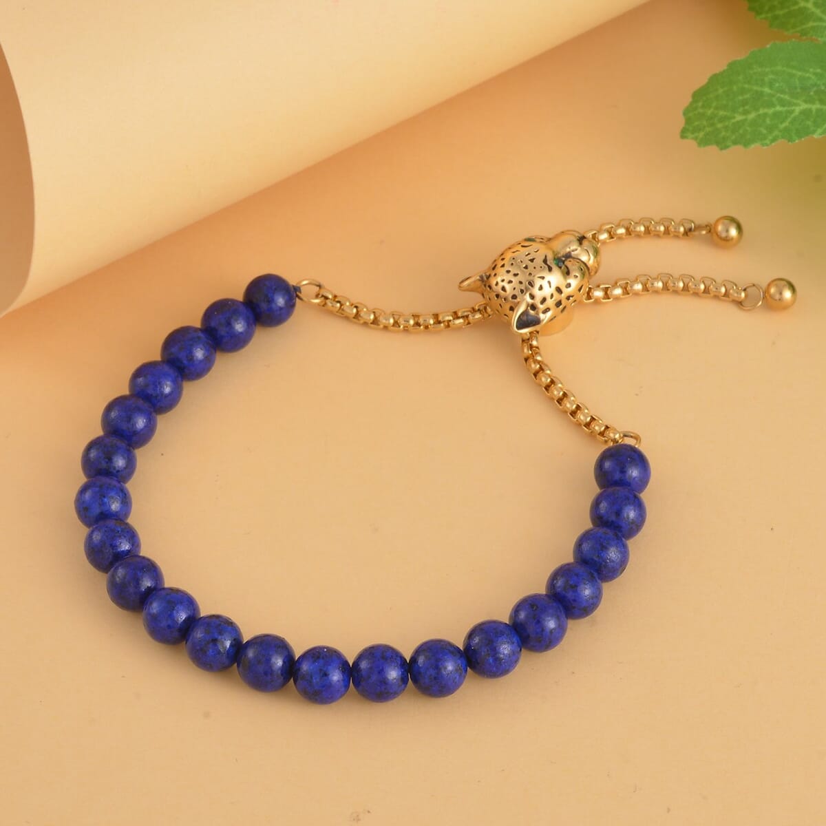 Lapis Lazuli and Neon Green Austrian Crystal Bolo Bracelet with Tiger Motif Slider Lock in ION Plated YG Stainless Steel (6-9In) 30.00 ctw image number 1