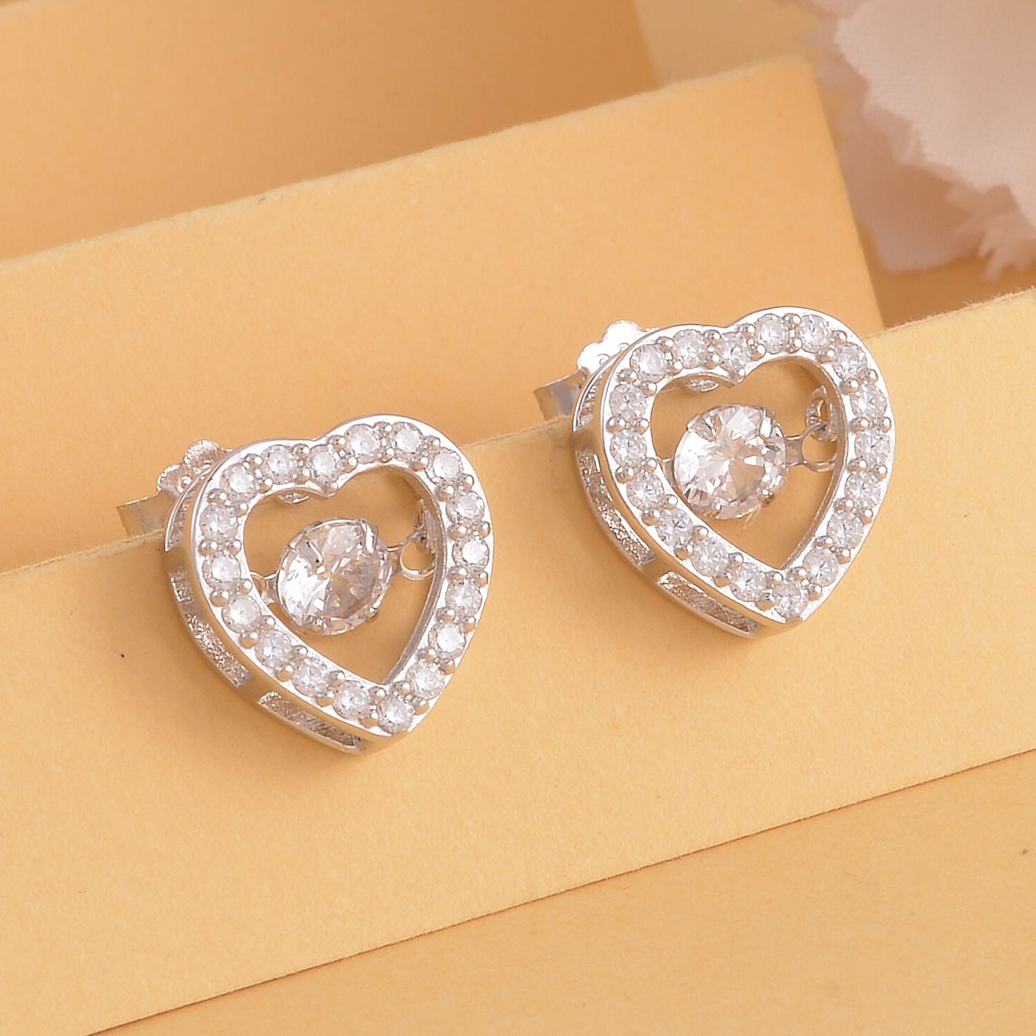 Simulated Diamond Heart Shape Dancing Earrings in Rhodium Over Sterling Silver 1.50 ctw
