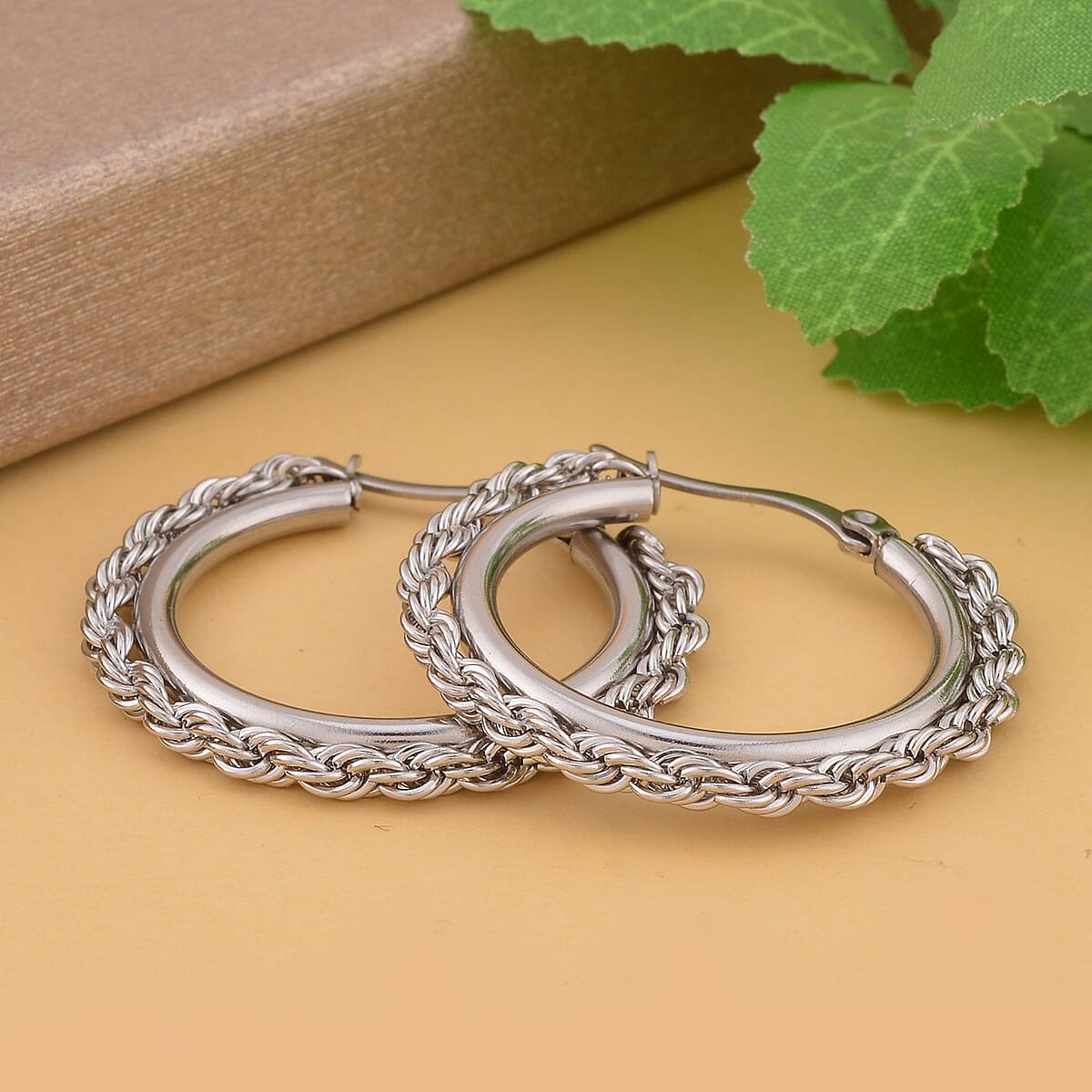 25mm Twisting of Rope Hoop Earrings in ION Plated YG Stainless Steel image number 1