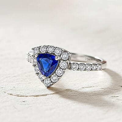 Tanzanite and Natural White Zircon Halo Ring in Platinum Over Sterling Silver (Size 10.0) 1.10 ctw