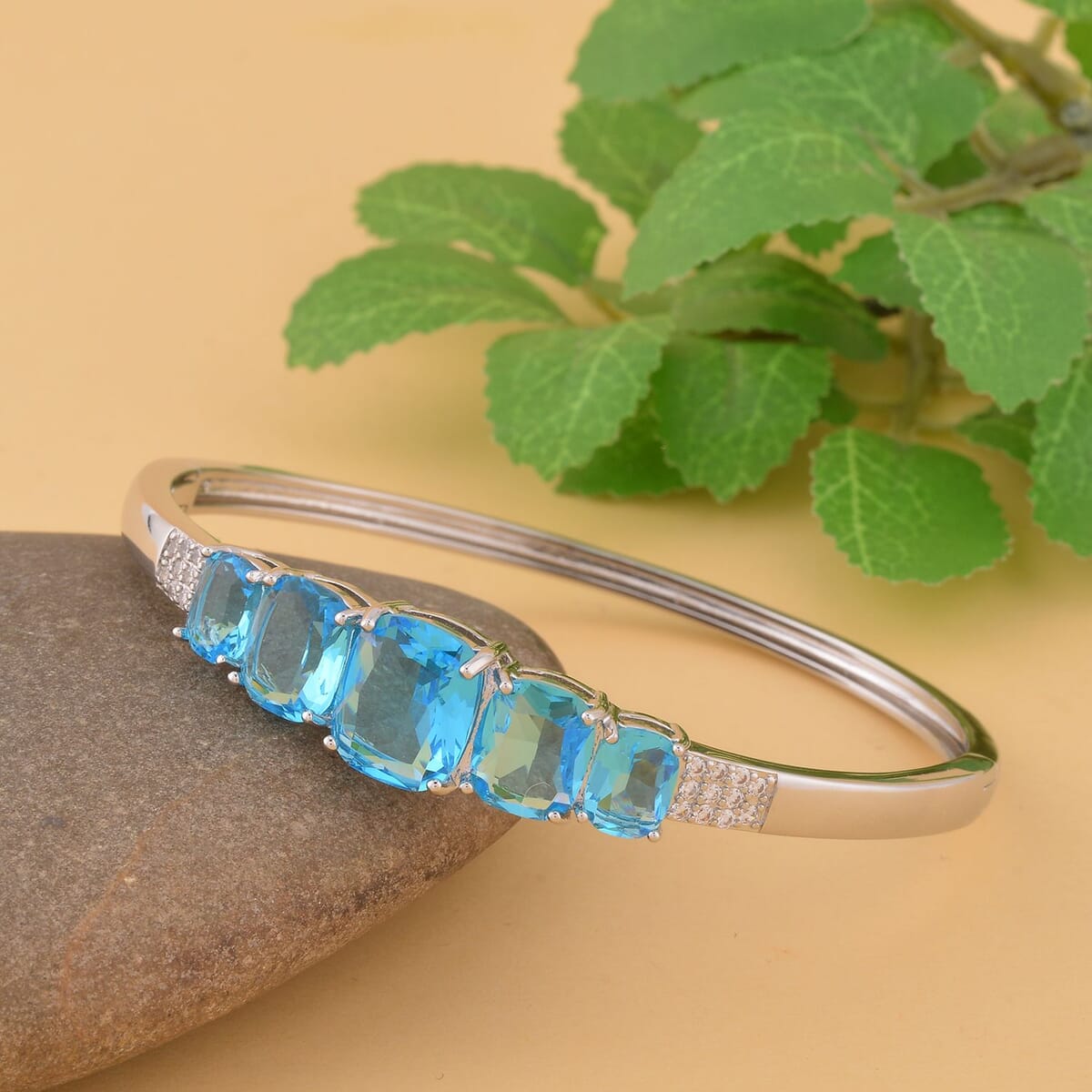 Simulated Aquamarine and Simulated Diamond Bangle Bracelet in Silvertone (6.50 In) 0.55 ctw image number 1