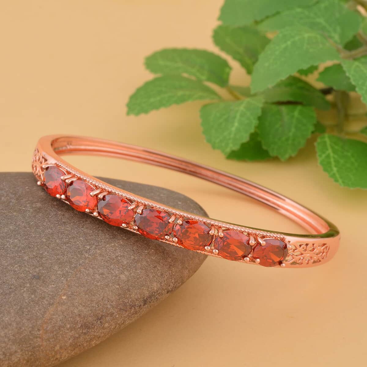 Simulated Red Diamond Bangle Bracelet in Rosetone (7.25 In) 13.75 ctw image number 1