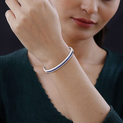 Simulated Blue Sapphire Color Diamond Bangle Bracelet in Silvertone (6.00 in) 2.85 ctw