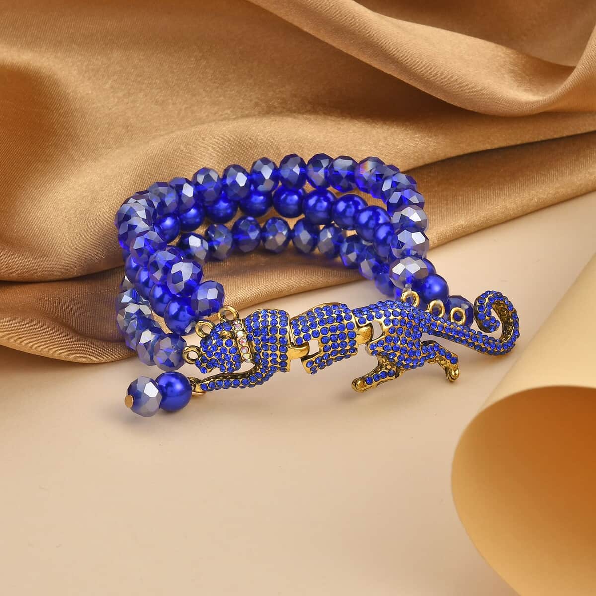 Simulated Blue Pearl and Multi Gemstone Multi Row Bracelet with Leopard Charm in Goldtone (7.5-9.5In) image number 1