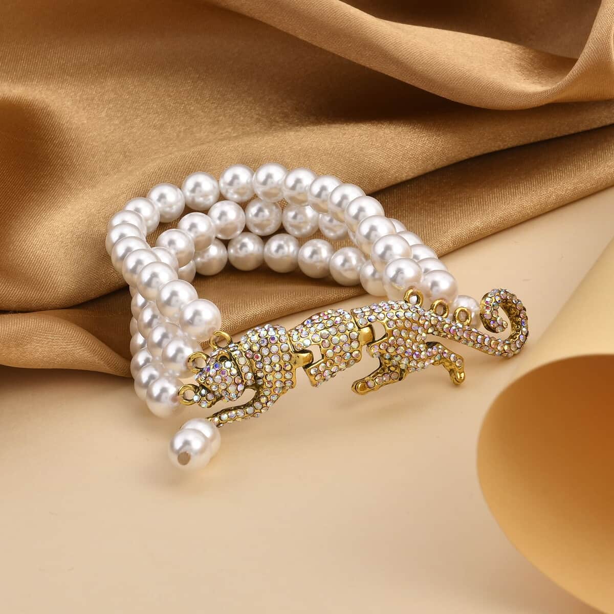 Simulated White Pearl and Mystic White Austrian Crystal Multi Row Bracelet with Leopard Charm in Goldtone (7.5-9.5In) image number 1