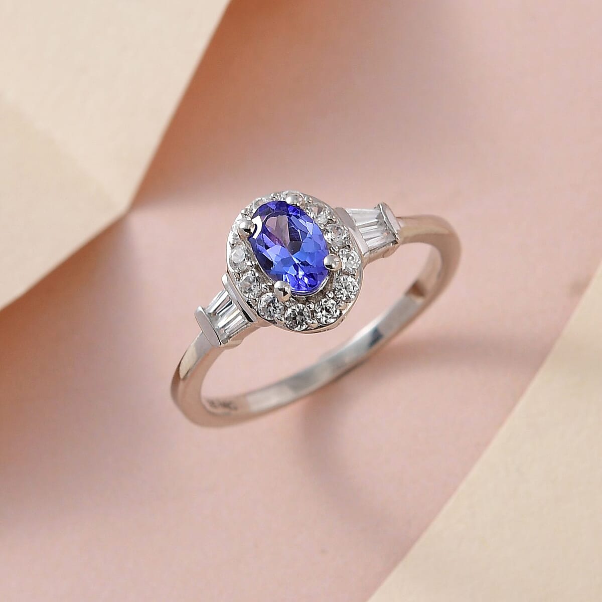 AAA Tanzanite and White Zircon Halo Ring in Platinum Over Sterling Silver (Size 8.0) 0.85 ctw image number 1