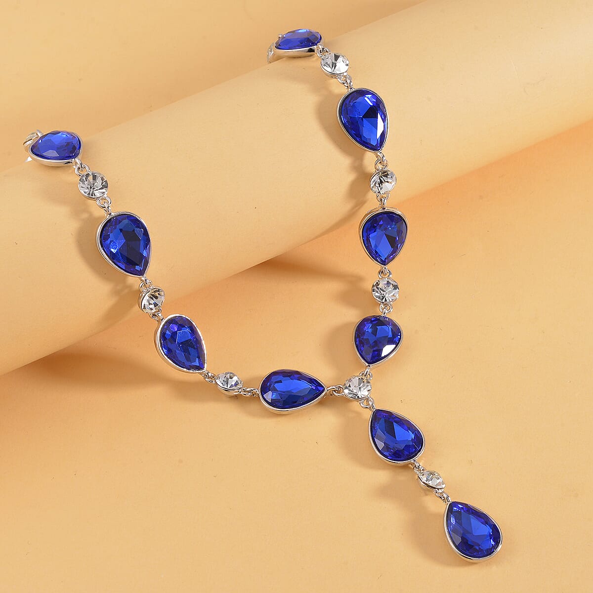 Simulated Sapphire and White Austrian Crystal Lariat Necklace in Silvertone 20-22 Inches image number 1