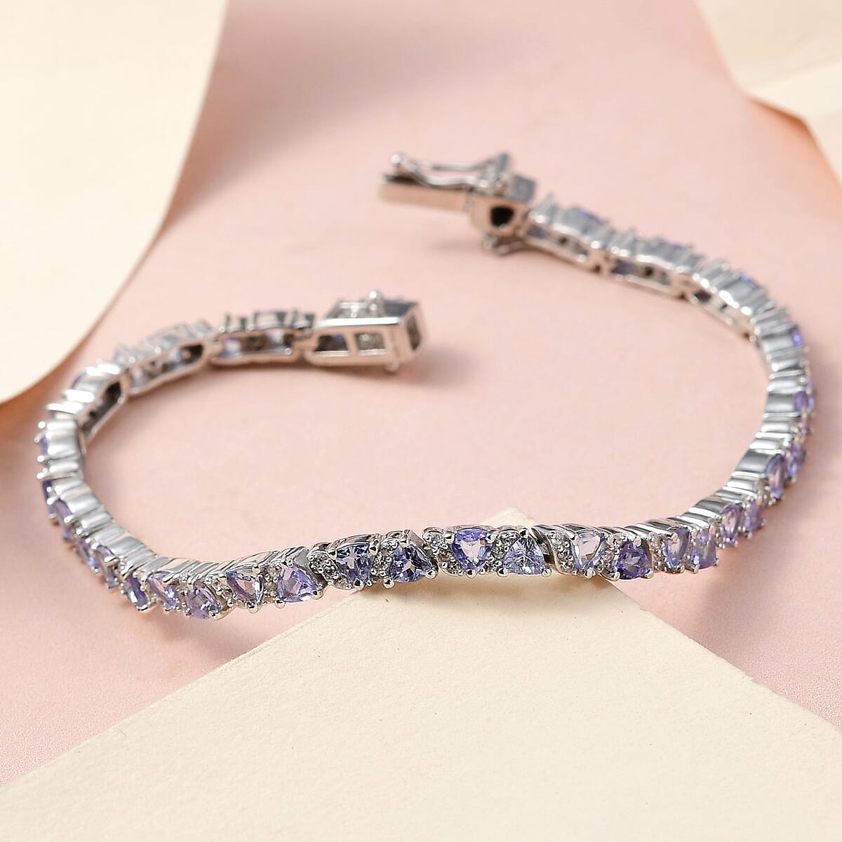 Tanzanite and Natural White Zircon Tennis Bracelet in Platinum Over Sterling Silver (6.50 In) 5.75 ctw image number 1