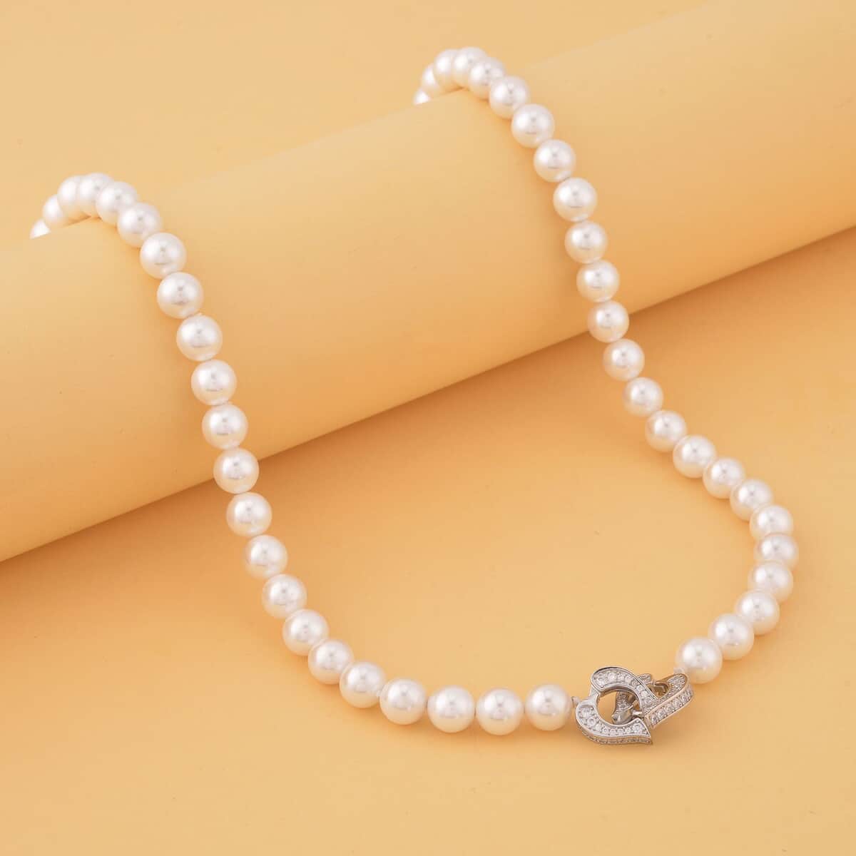 White Color Shell Pearl and Simulated Diamond Beaded Necklace 22 Inches in Silvertone 0.50 ctw image number 1