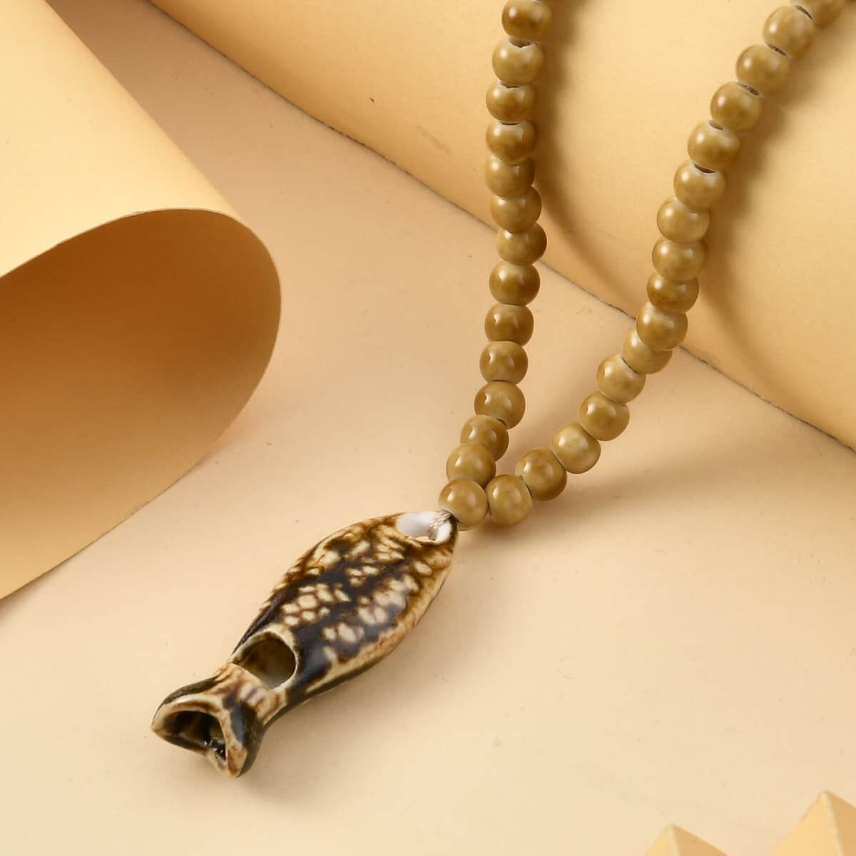 Brown Color Ceramic Beaded Whistle Pendant Necklace 22-24 Inches in Silvertone image number 1