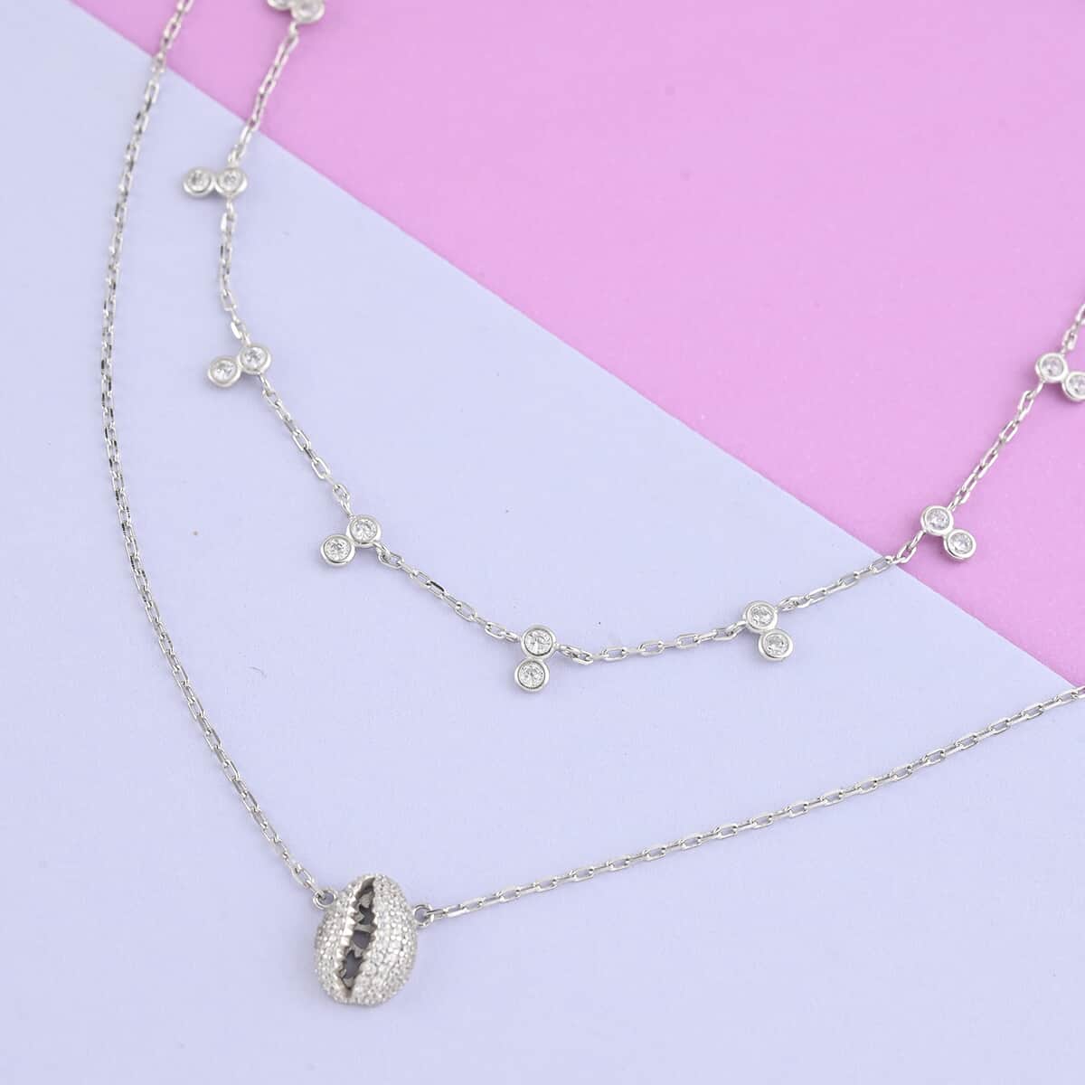 Simulated Diamond Puka Shell Station Necklace 14 Inches in Sterling Silver 2.30 ctw image number 1