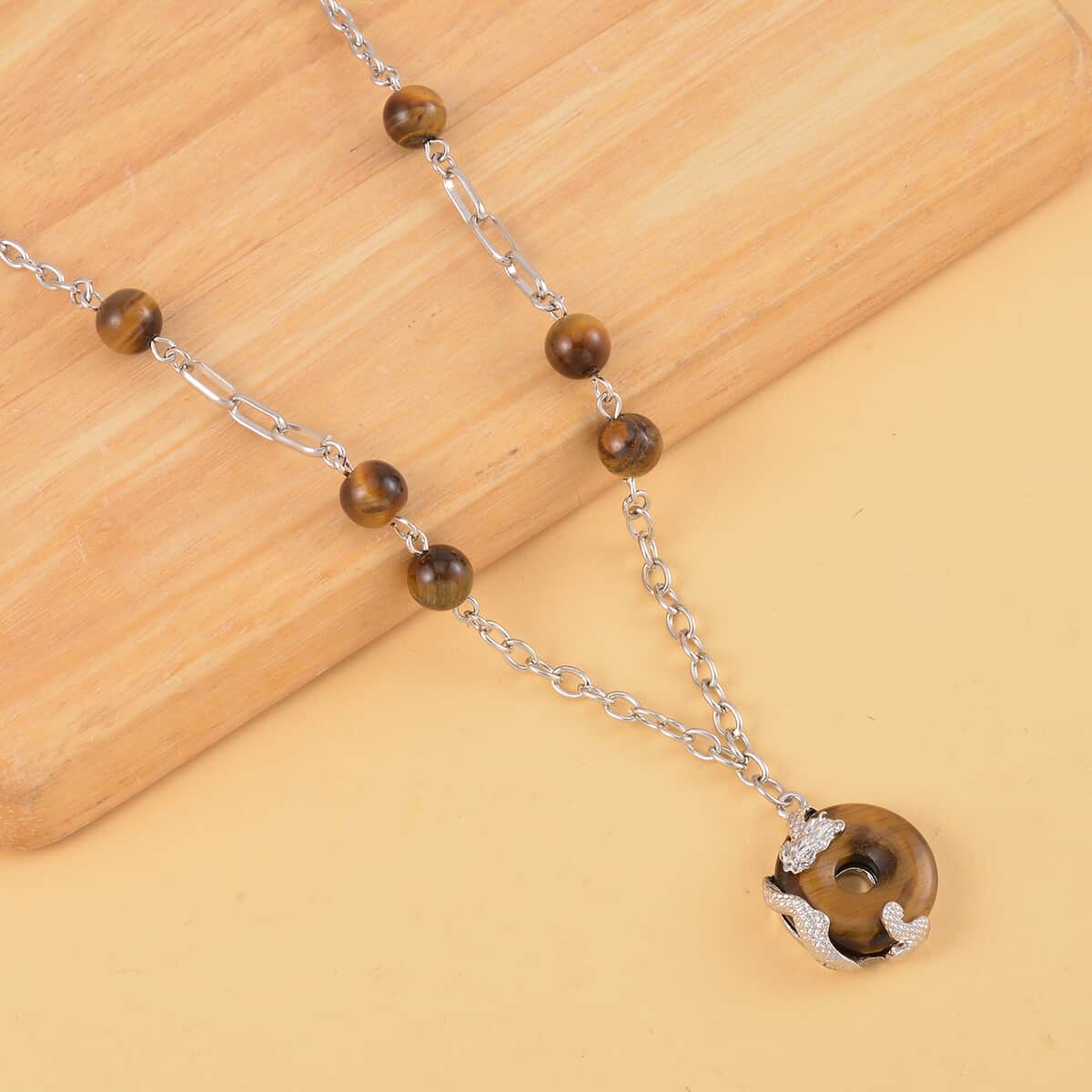 Yellow Tigers Eye Dragon Pendant Necklace 20-22 Inches in Silvertone 18.00 ctw image number 1