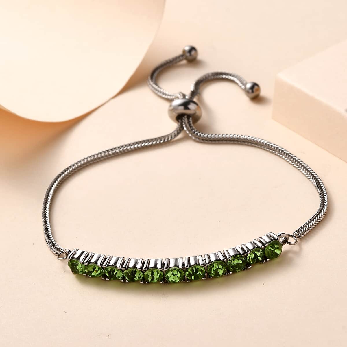 Peridot Color Crystal Bolo Bracelet in Stainless Steel , Tarnish-Free, Waterproof, Sweat Proof Jewelry image number 1