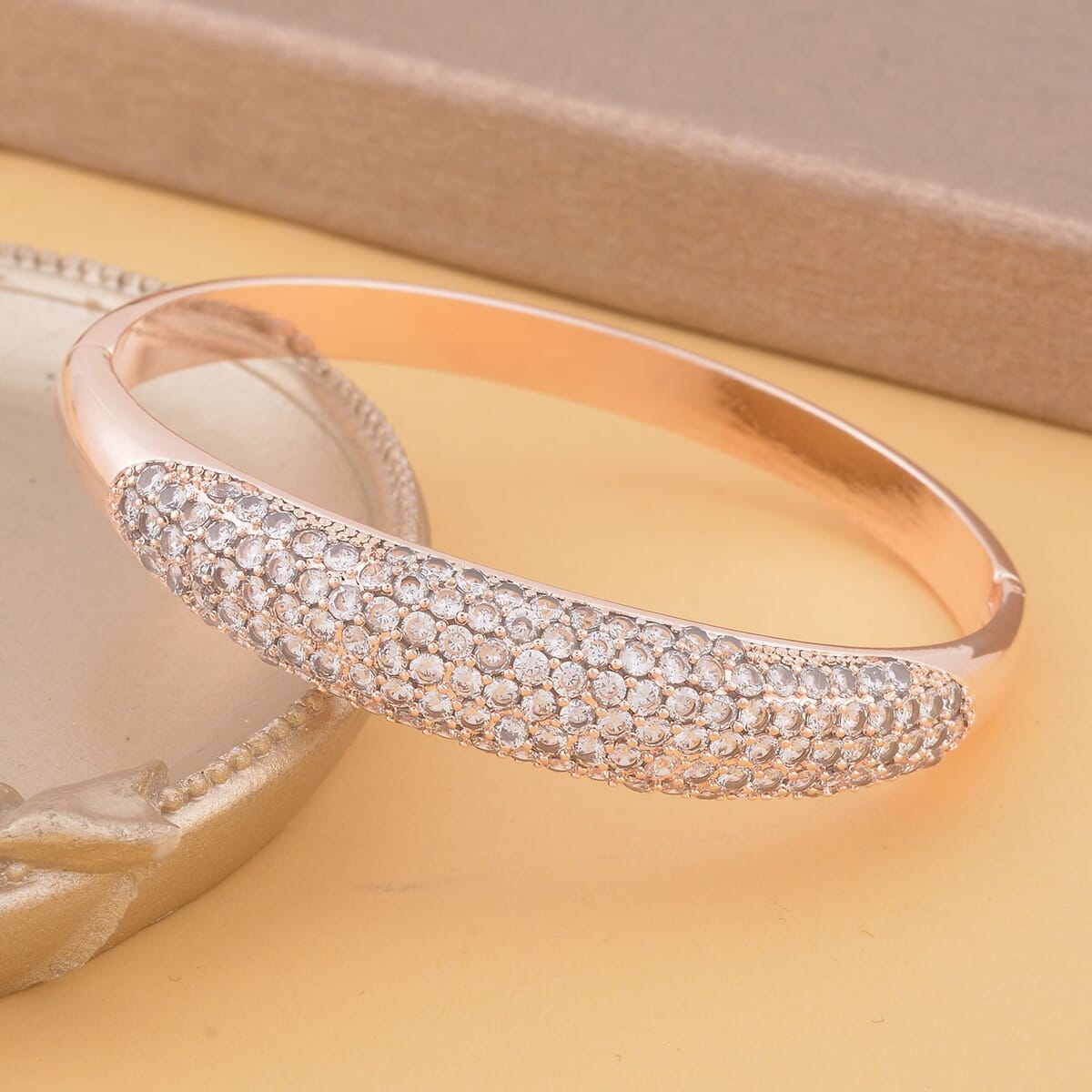 Simulated Diamond Bangle Bracelet in Rosetone (6.75 In) 5.50 ctw image number 1
