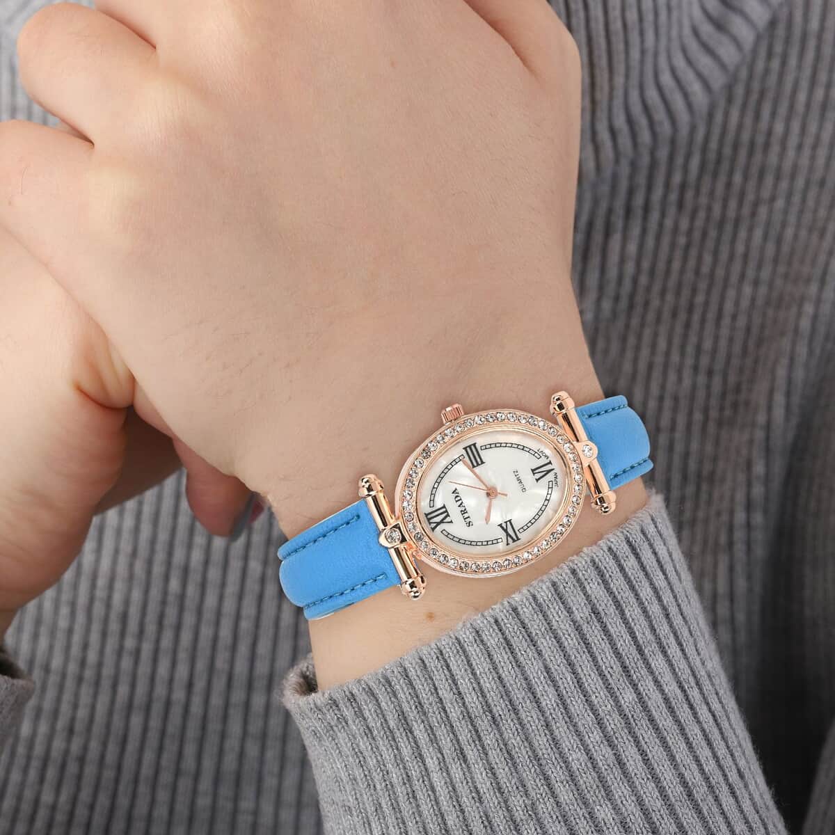 Strada White Austrian Crystal Japanese Movement Watch in Rosetone with Blue Faux Leather Strap (27.94-34.29mm) (6.75-8.50 Inches) image number 2
