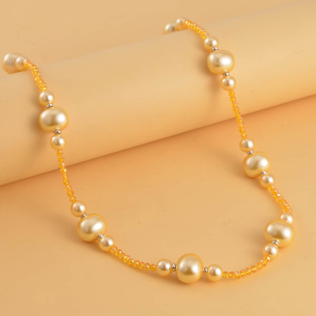 Golden Color Shell Pearl and Champagne Glass Beaded Necklace 28-30 Inches in Silvertone image number 1