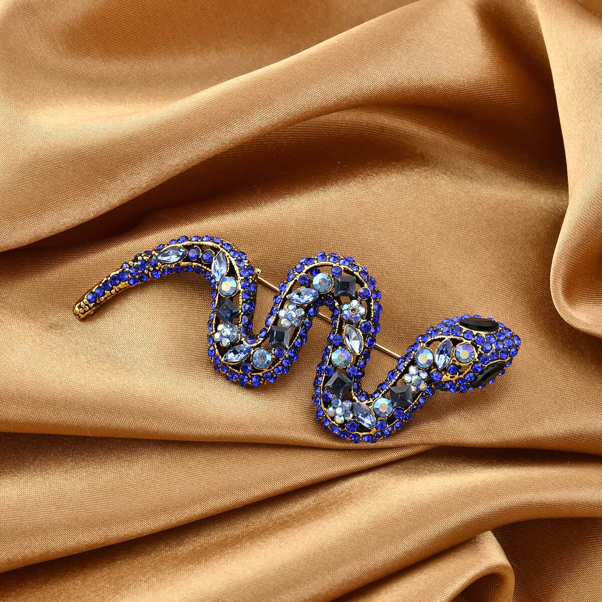 Black and Blue Glass, Blue Magic Austrian Crystal Snake Brooch in Goldtone image number 1