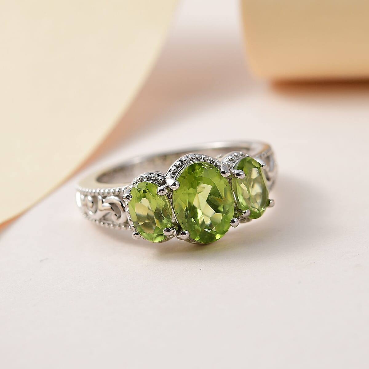 Karis Peridot 3 Stone Ring in Platinum Bond (Size 10) 2.20 ctw image number 1